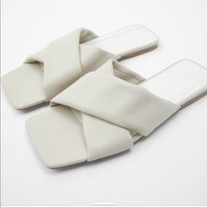 Flat padded leather sandals